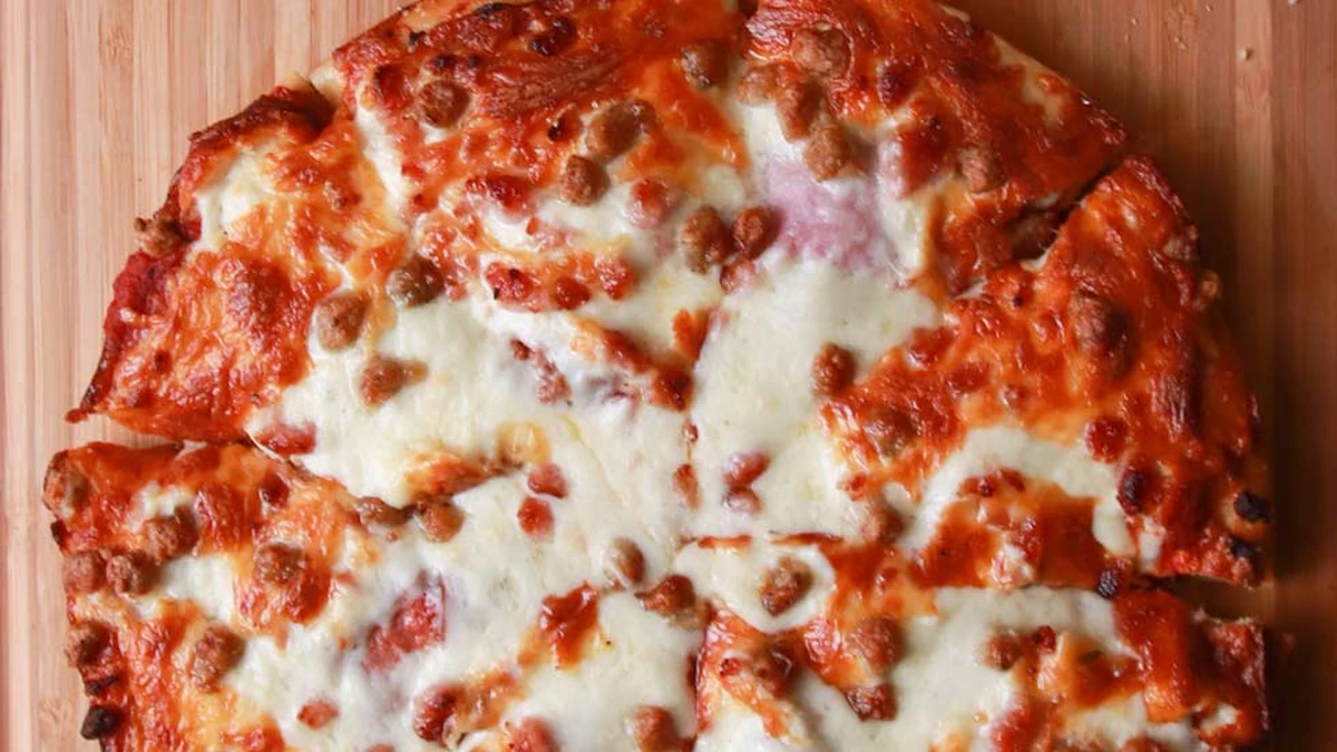 Meat Lovers pizza with ham, bacon, pepperoni, sausage and beef at Monty's Pizza in Edmonton, AB